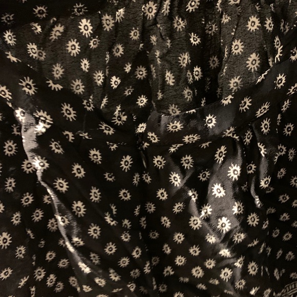 Olivaceous Black and White Halter Floral Patterned Romper - Picture 8 of 9